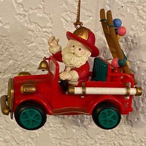 Vintage Christmas Tradition Ornament 1995 Santa in a Red Fire Truck